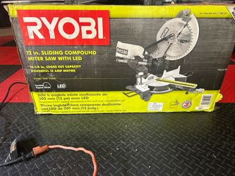 Ryobi sliding compound mitre saw, with 2 96t blades!