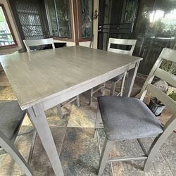 Table With 4 Chairs In Good Condition