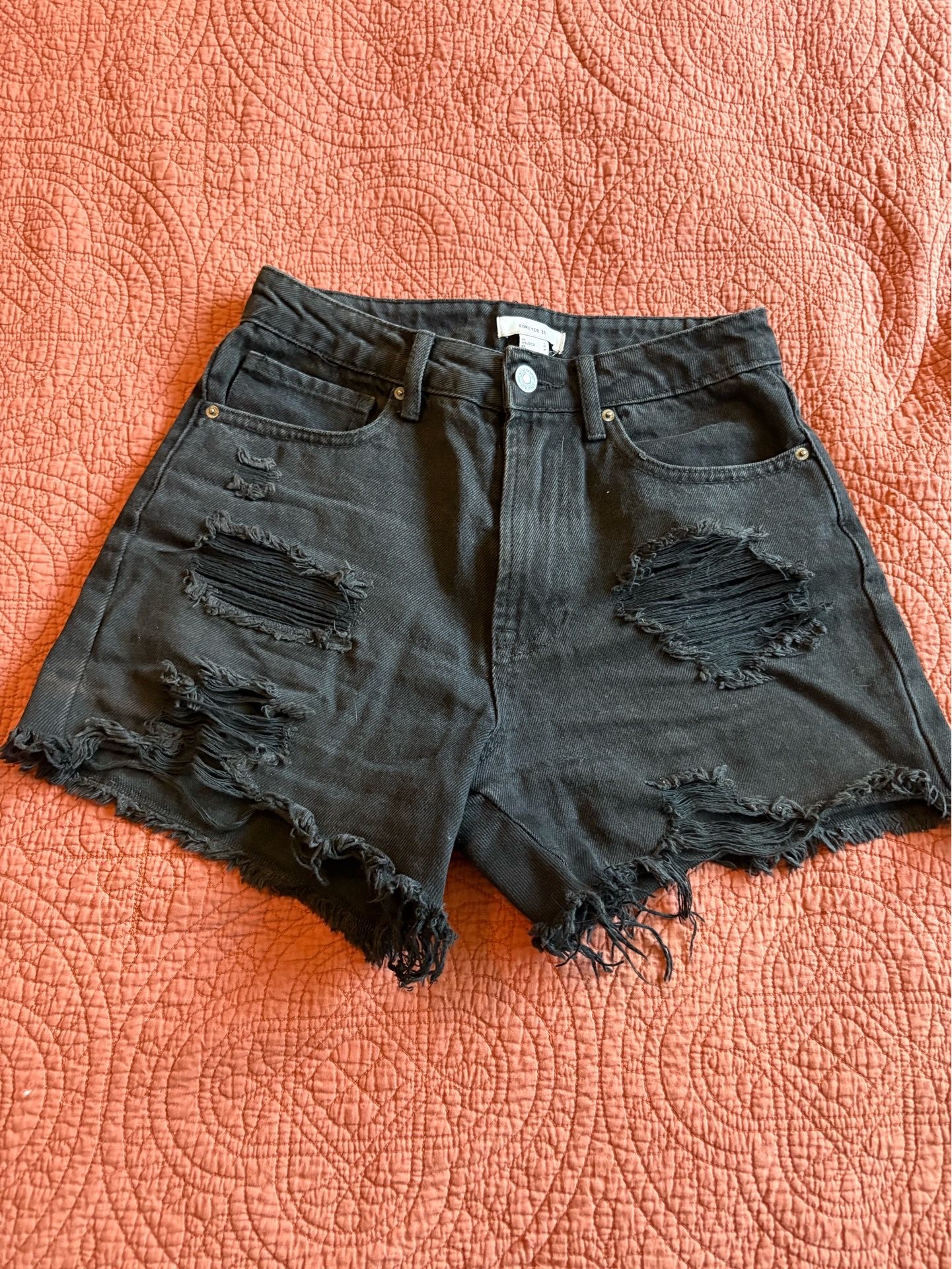 Distressed black shorts