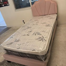 Twin size bed frame with pillow top mattress included