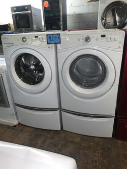 WHIRLPOOL front load washer and matching electric dryer with pedestals in excellent conditions