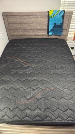Queen bed frame + Sealy Posturepedic mattress. Good condition, clean, ready for pickup.