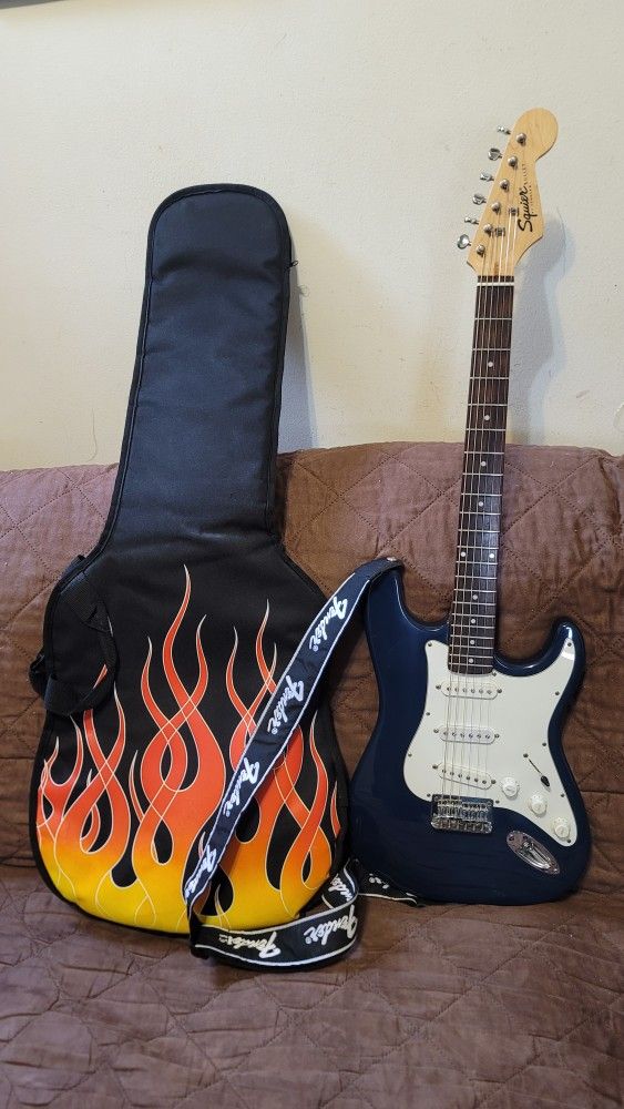 SQUIER STRATOCASTER BY FENDER BULLET 6 STRINGS ELECTRIC GUITAR MADE IN INDONESIA IN BLUE COLOR.