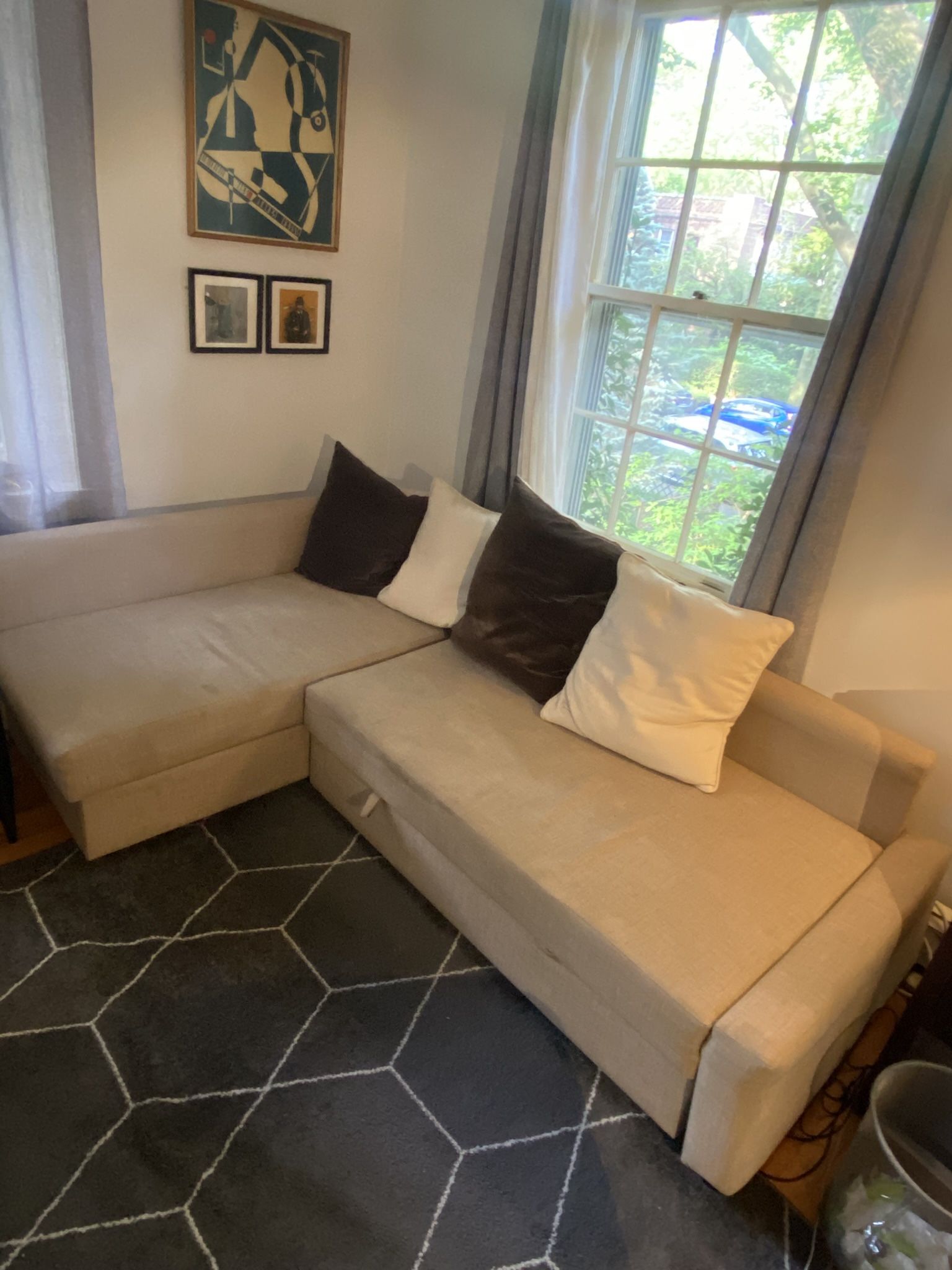 Sectional couch (beige, upholstered) with pullout compartment for sleeping