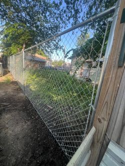 New 6 foot chain link fence