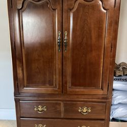 SOLID WOOD ARMOIRE DOUBLE DOORS WITH TWO BOTTOM DRAWERS GOOD CONDITION