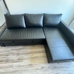 Sectional black leather couch