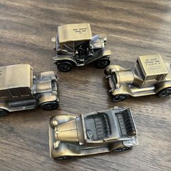 4 Vintage Cast Metal Brass Plated Coin Banks /Chicago. Rare To Find All Four!