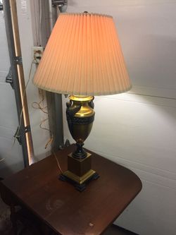 Vintage brass sculpture lamp.