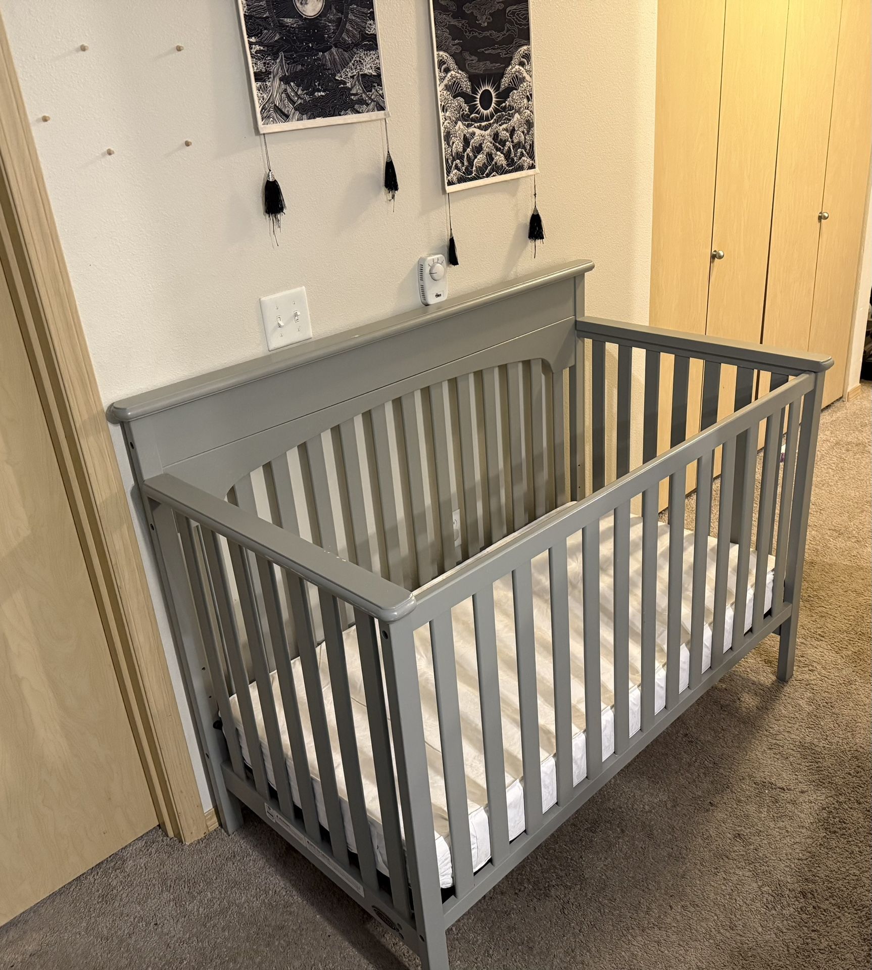 Gray Graco Crib