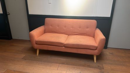 Pink loveseat