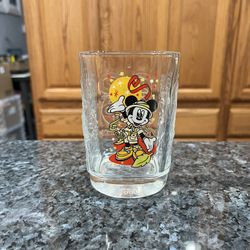Walt Disney World 2000 Mcdonald's Commerative Glass Featuring Minnie Mouse.  Size approximately 4 1/2 inches tall.  Has been on display in a cabinet. 