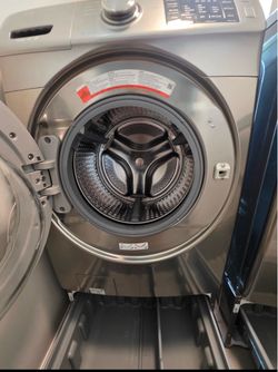 Samsung Front-Load Washer and Dryer Set with pedestals
