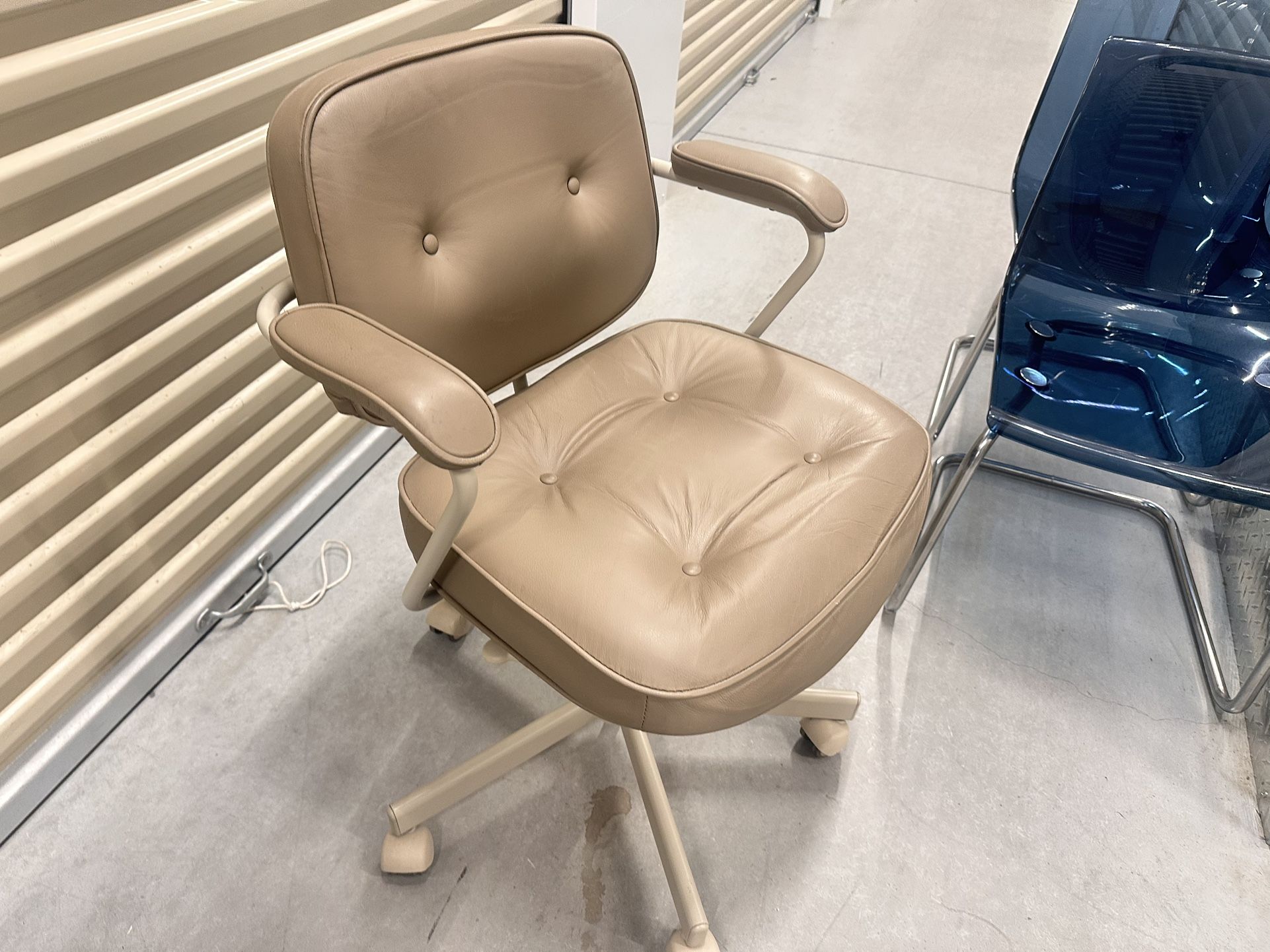 IKEA 100% Leather office chair, adjustable and adjustable seat msrp$400 before tax