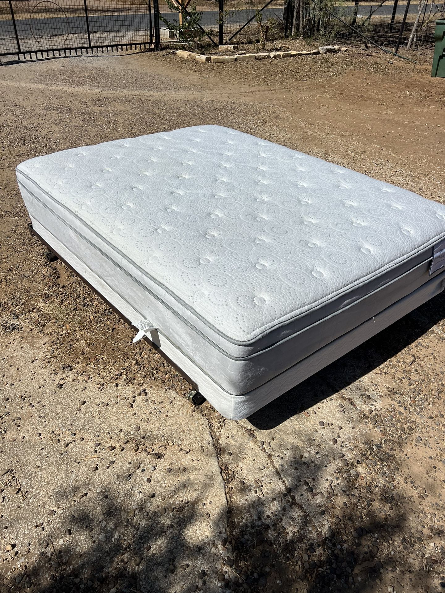 Queen size mattress and box spring and metal rails good condition and