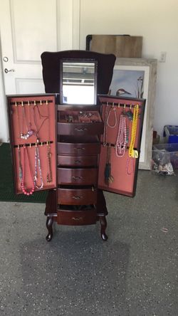 Large standing wood jewelry box filled with costume jewelry