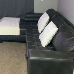 Brown/black faux leather couch