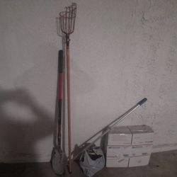 Shovel, Long Thing With a Rack thing, And A Bag Of Stuff