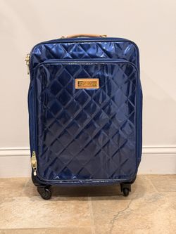 Joy & Iman blue quilted spinner luggage carry-on