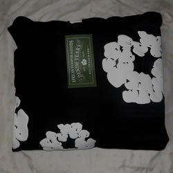 Black and white denim tear sweater