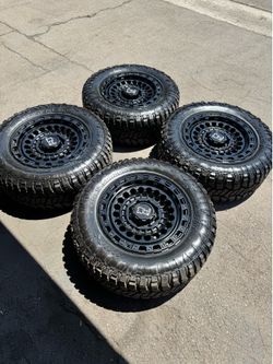 New 20x9.5 Black Rhino “Sentinel” Wheels 35/12.5R20 Avix Trailtek RT Tires For 8x170 Ford F250 F350