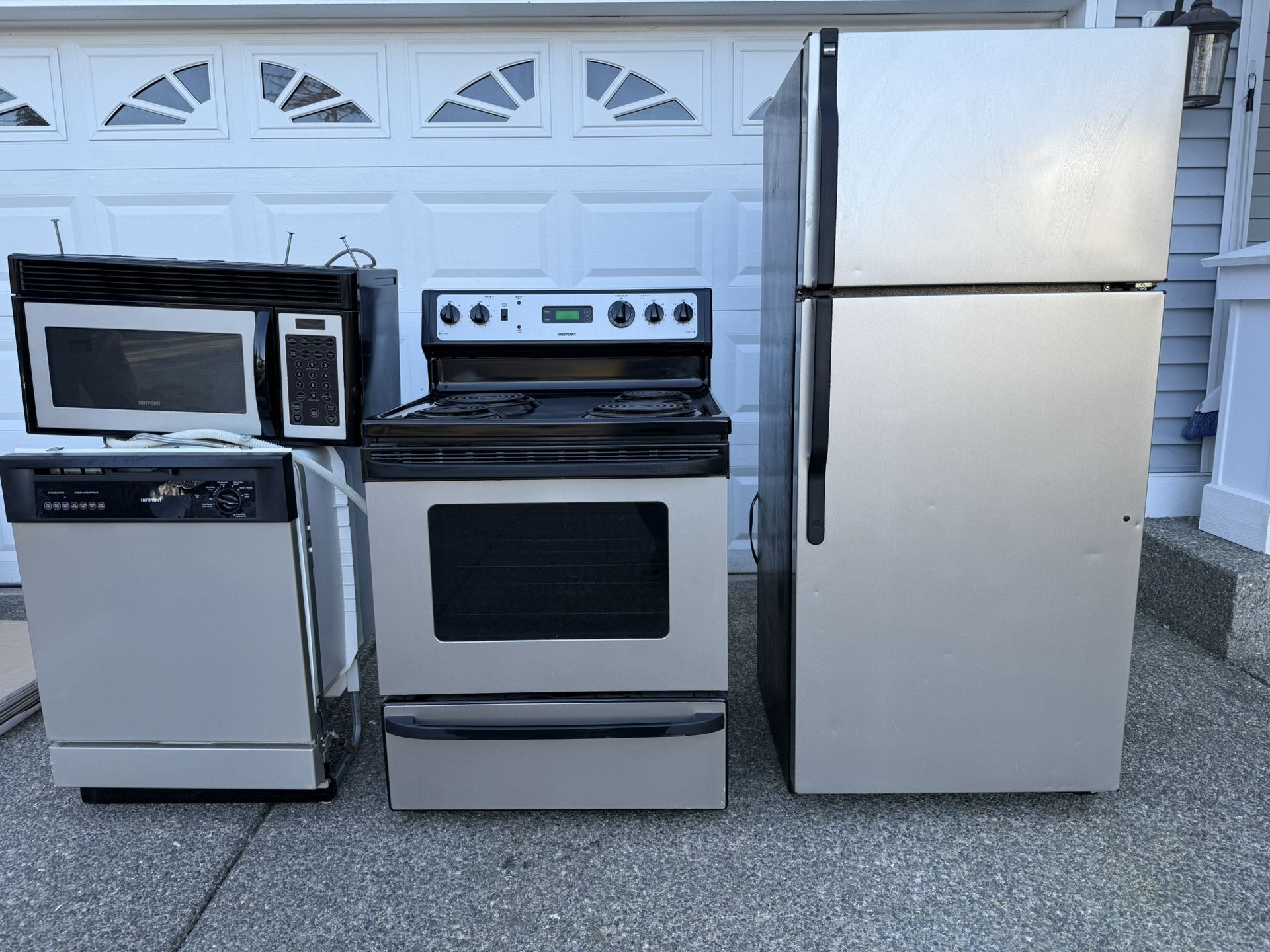 Refrigerator, Electric Stove, Dishwasher, Over The Range Microwave 