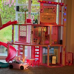Barbie dream house with barbie car