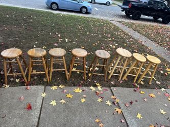 eight Solid stool chairs.  