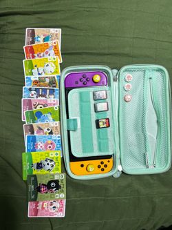 Nintendo Switch with Games , 12 amiibos, dock and SD card