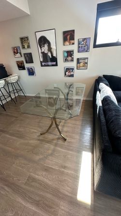 Glass dining table 66in L X 40in W