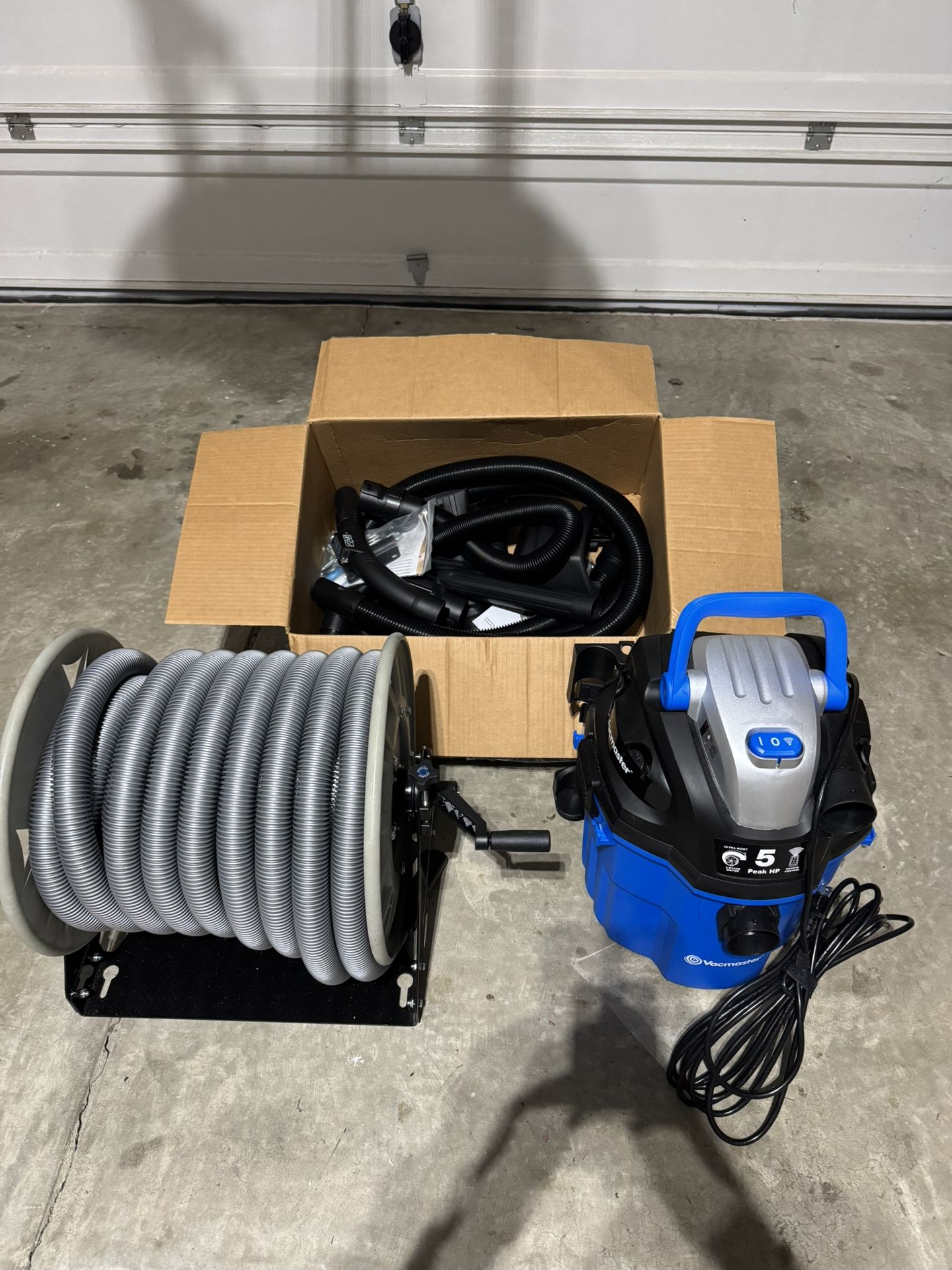 5-GALLON* 5 PEAK HP† REMOTE CONTROL WALL MOUNT WET / DRY VACUUM VWMB(contact info removed)