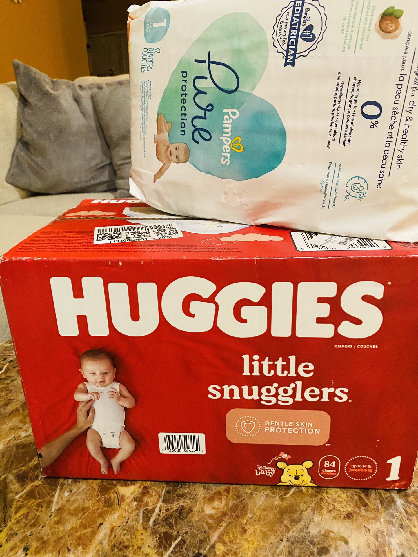 Size 1 Diapers / Huggies & Pampers Pure   Price is for Both 