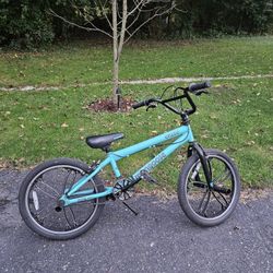 Mongoose Craze Kids BMX Bike, 20-in. Wheels, Kids Ages 6+, Black & Mint Child Bicycle