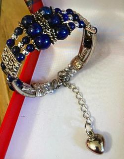 Pulseras aro stainlend piedras cada una
