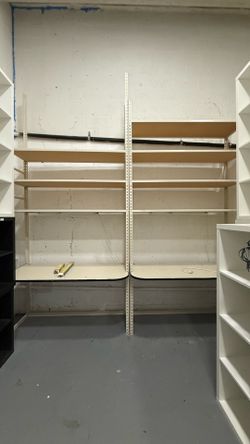 (2) boltless warehouse shelving units with workstations