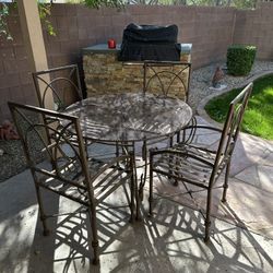 Solid Wrought Iron Table And Chairs 