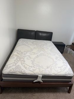 Queen size bed with 2 night stands