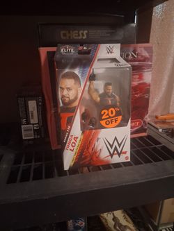 Autographed Tonga loa action figure