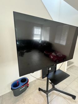 Large 65 inch smart Flat Screen TV on Rolling Stand
