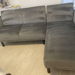 Small gray sofa excellent condition no dogs no cats