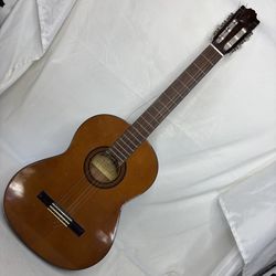 Old Yamaha Acoustic Guitar Broken String