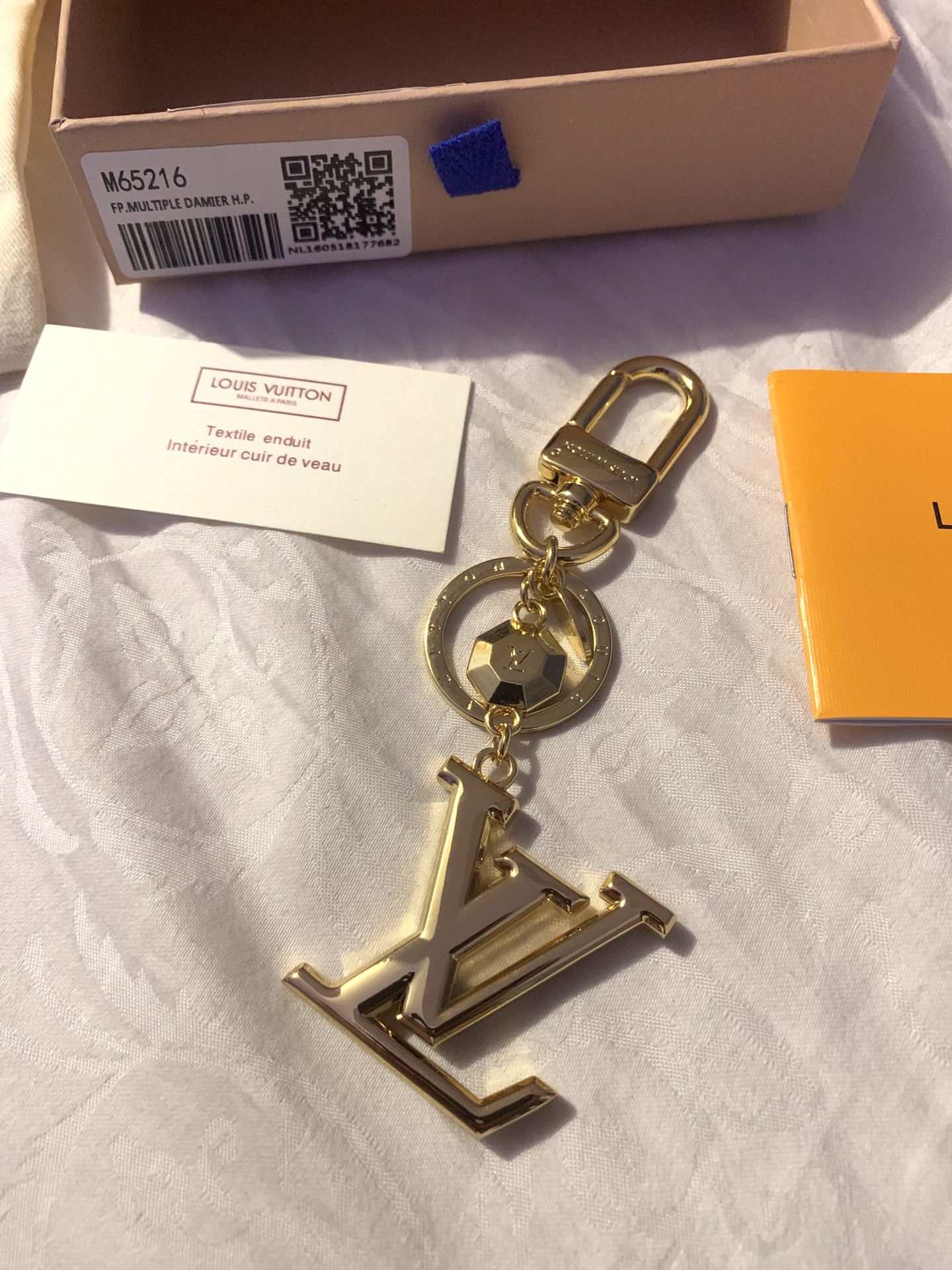 Louis Vuitton Bag Charm Key Holder LV Facettes Gold in Brass with Brass - US