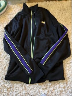Women’s Nike track suit Medium