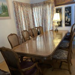 The evening table is 9 feet and 3 inches wide, 43 inches high and 29.5 inches