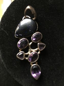 Amethyst  Pendant Set In sterling. Silver