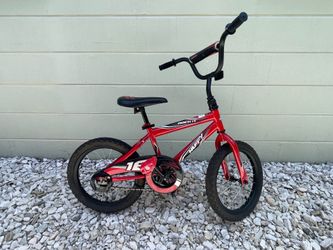 Boys Huffy red 16” bicycle; Girls Pacific Gleam  purple and aqua 16” bicycle