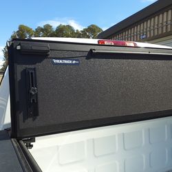 Hard truck bed cover only a year old