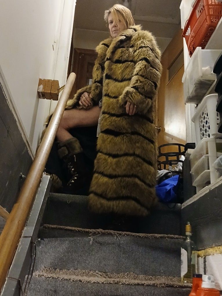 Gentlemen,  Just in time for that perfect gift  for your wife or that special lady in your life. A beautiful  full Length fox fur coat and boots