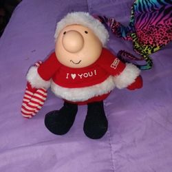 vintage Tom Wilson Ziggy Christmas plush likely from 1985