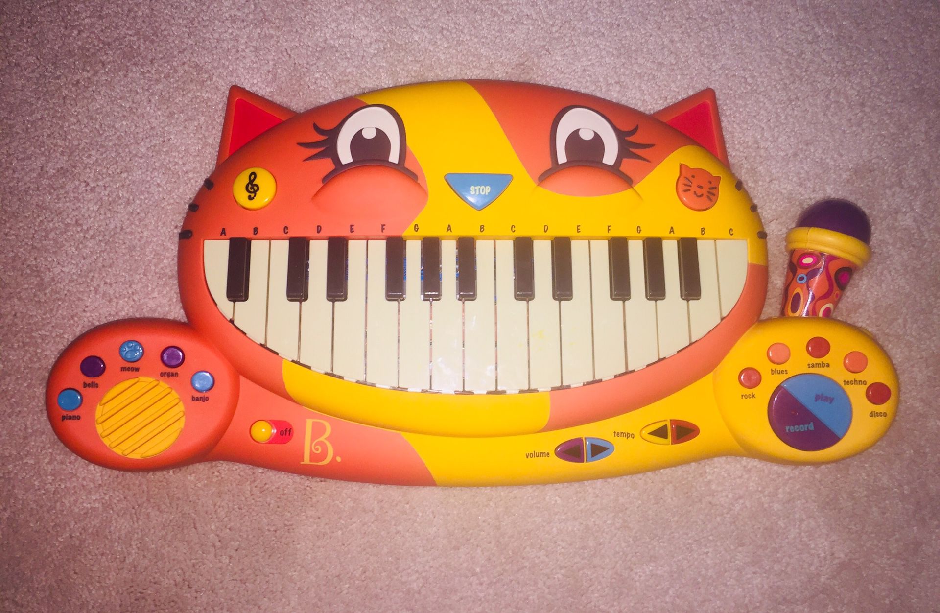 B. toys Cat piano / keyboard with free play, recording feature, working microphone and preprogrammed sounds/songs.
